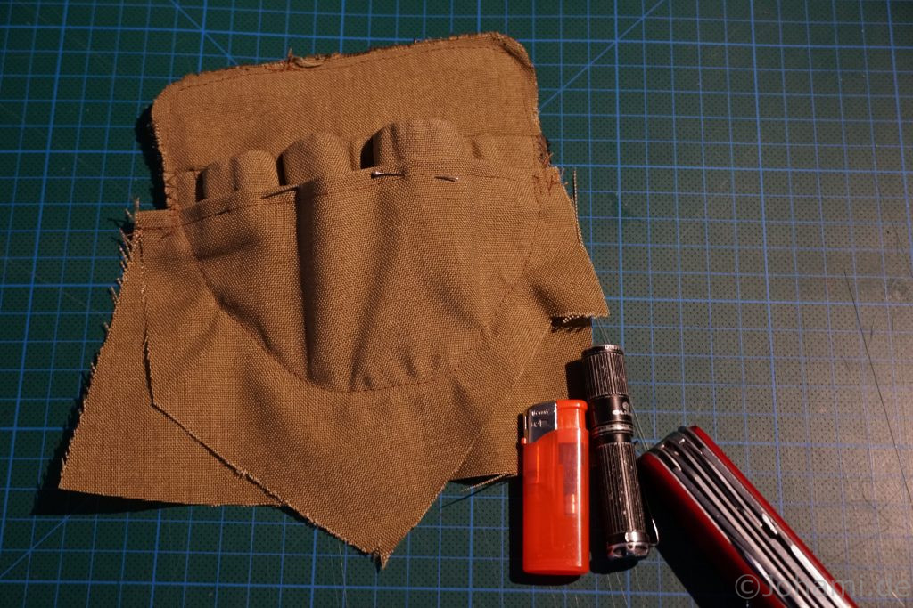 Tasche festgenäht.